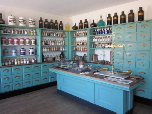 Shelves of period bottles in the McDowell apothecary shop