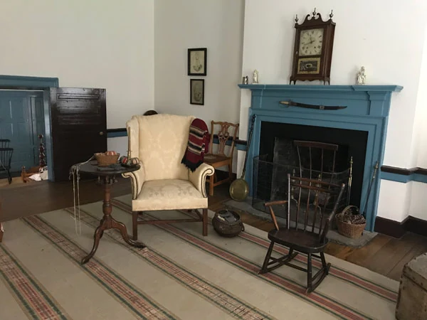 A furnished bedroom on the second floor of McDowell House